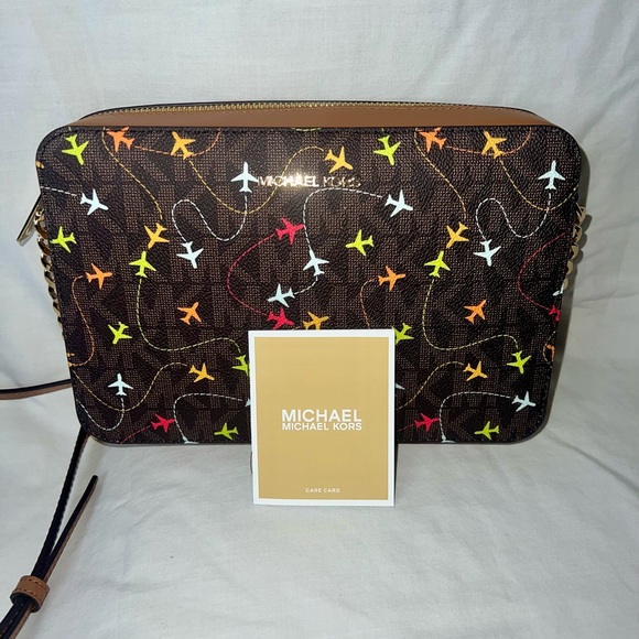 NWT Michael Kors Jet Set Crossbody Bag Airplane Print Authentic Brown - Picture 1 of 7